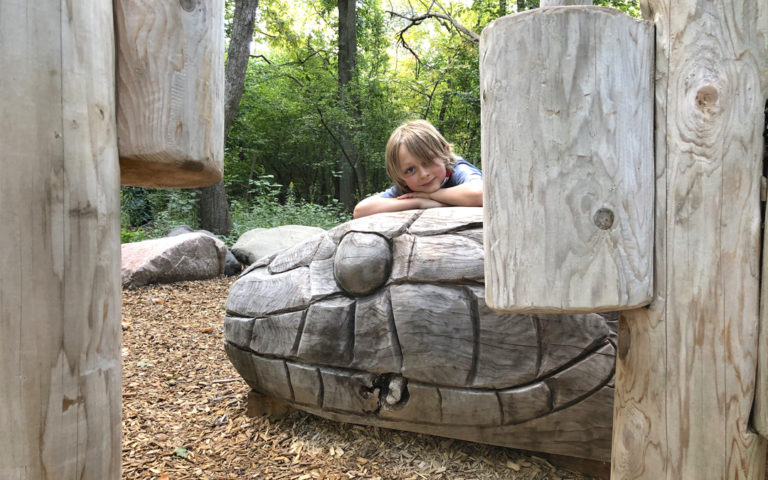 gordon weeden woodlot natural playground forest robinia logs snake sculpture