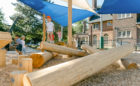 Toronto preschool playground log pile climbing